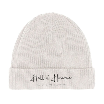 Beige Beanie Mütze mit einem Schwarzen Aufdruck von Hall of Horsepower Automotive Clothing am unteren Rand der Mütze. 