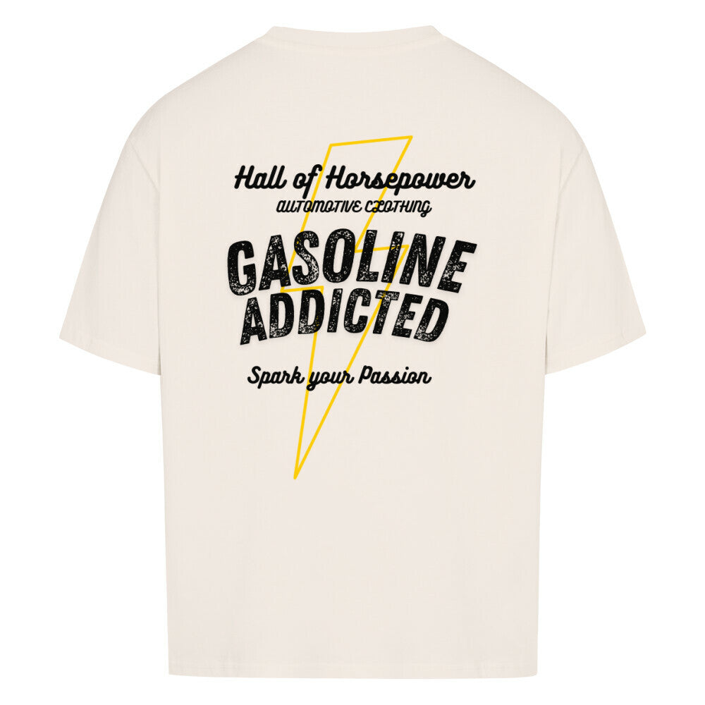 Beiges oversized shirt mit einem gelben blitz als umriss im Hintergrund. Davor ein Schriftzug mit Gasoline Addicted, Spark your Passion. Als Überschrift steht dort Hall of Horsepower Automotive Clothing. Schriftzug ist in Schwarz gehalten. Zündende Ideen beschreiben das shirt und soll menschen motivieren.