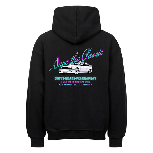 Schwarzer Oversized Hoodie mit Kapuze von hinten mit dem Aufdruck Save the Classic, einem BMW E30, Drive Break Fix Repeat und Hall of Horsepower Automotive Clothing in der Mitte vom Rücken. Farblich in türkis und Pink kombiniert